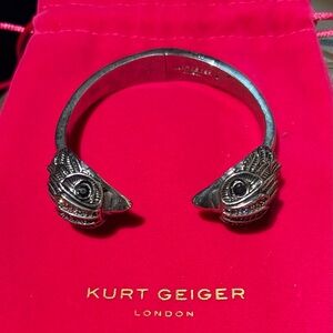 Kurt Geiger Silver Eagle Head Cuff with Pink Pouch Accent